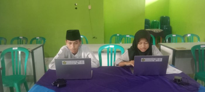 Dua Siswa Terbaik MTs Negeri 2 Batang Hari Ikuti Uji Coba OMI Tingkat Provinsi